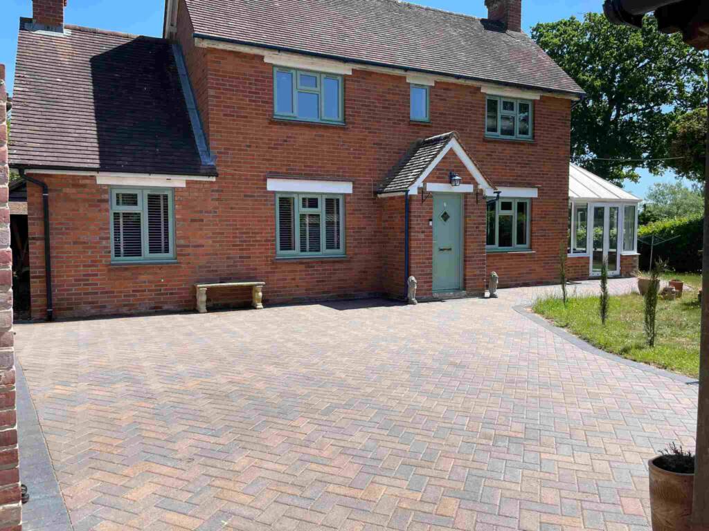 Hardscaping 1 Detached house with brick driveway